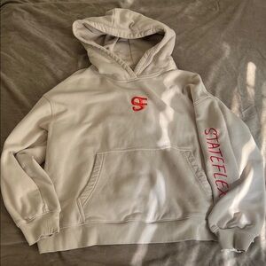 STATE Cream Hoodie with Red Accents